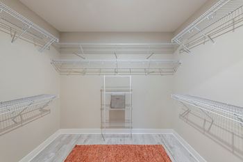 Spacious walk-in closets with custom organizers